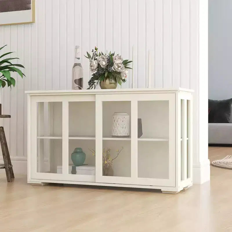 Meuble de rangement de cuisine blanc de 106,7 cm avec portes vitrées, comprenant deux portes coulissantes en verre, deux grilles d'aération latérales et une étagère réglable.